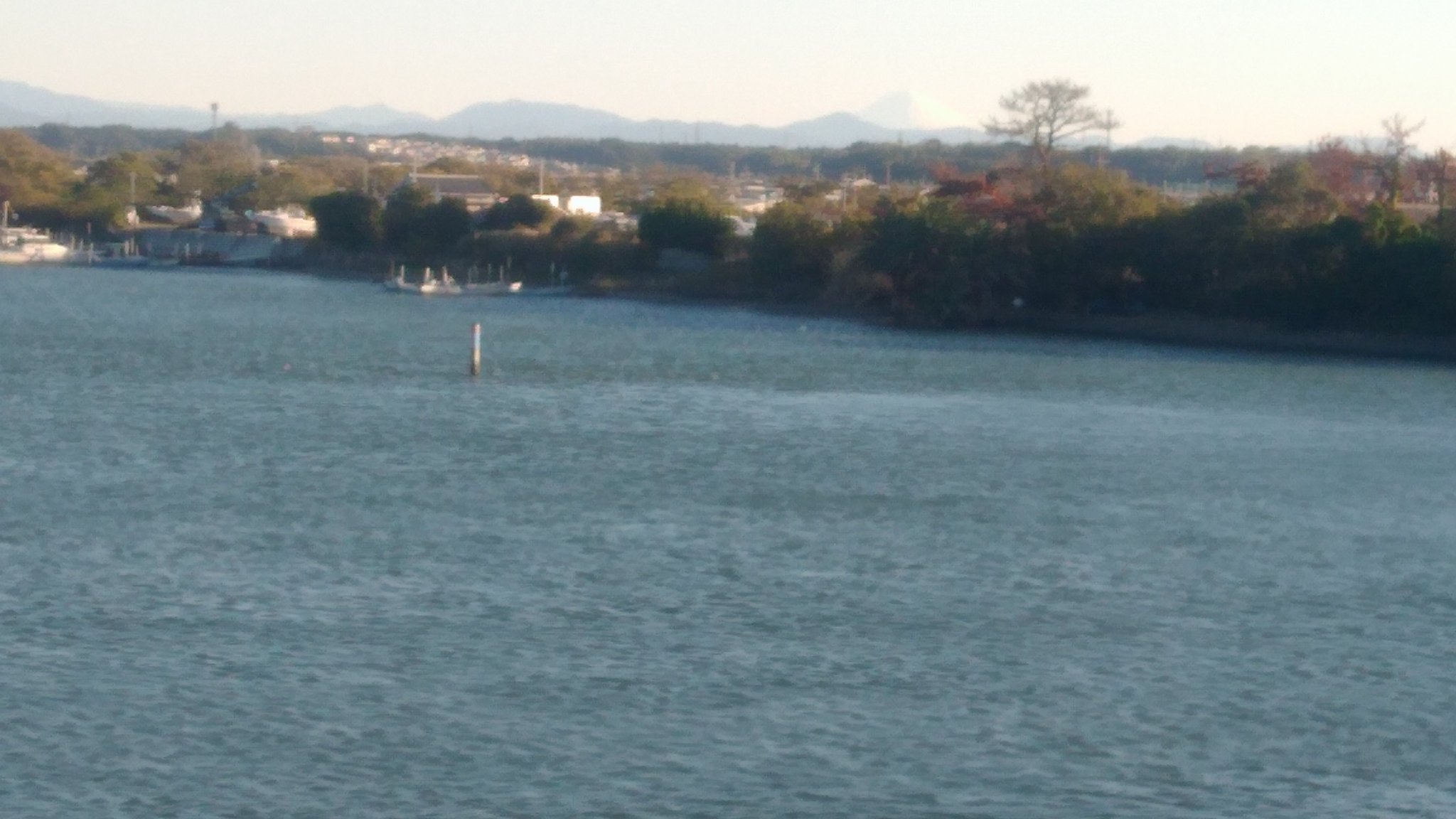 Distant Mt. Fuji seen from Lake Hamana